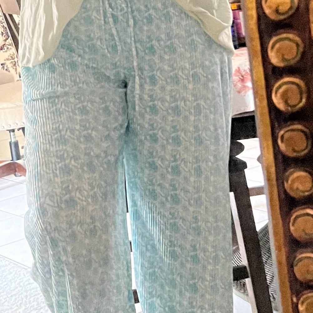 Light green with white background pattern pants.